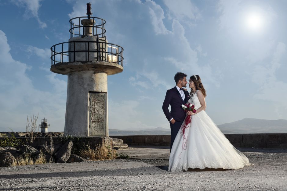 Romantic couple in elegant wedding photography pose